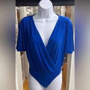 Blue Bodysuit
Brand: Express
Size: XS